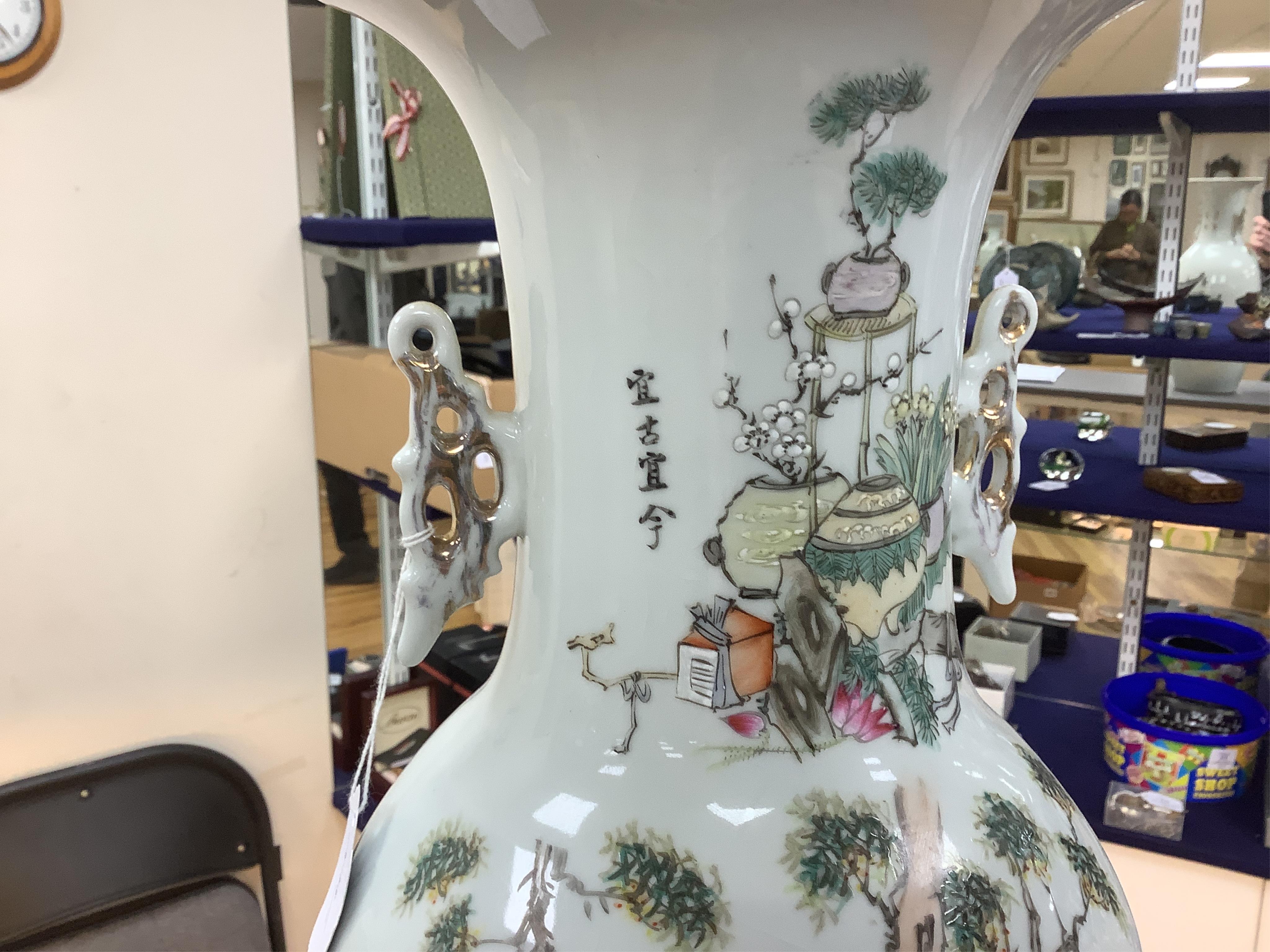 A large Chinese famille rose figural vase, 57cm high
